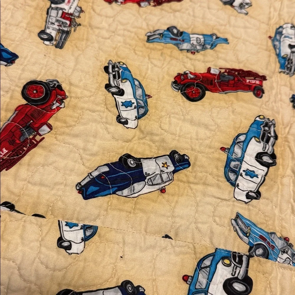 Handcrafted child's crib or lap quilt